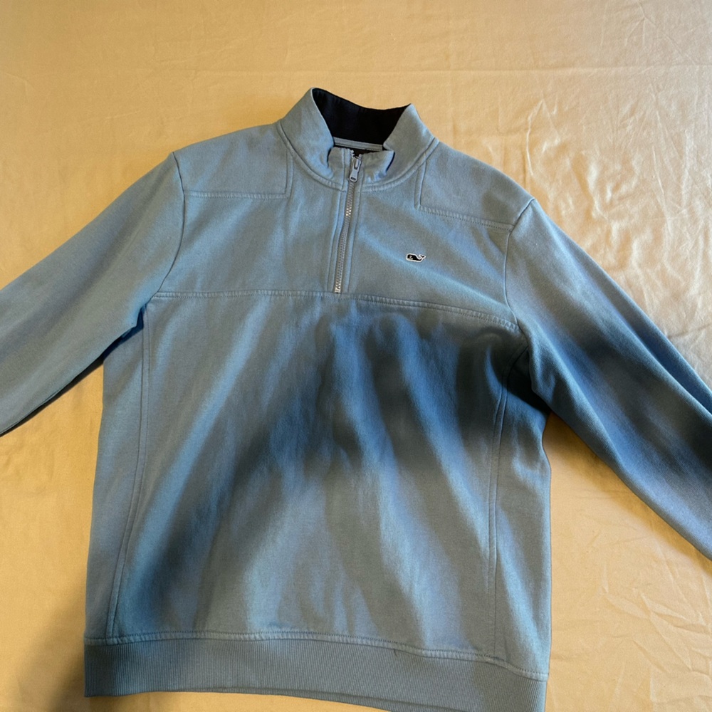 used men’s size medium half zip sweater in a light blue and by vineyard vines.